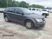 2014 Dodge Journey SE z VIN 3C4PDCAB2ET151405, wystawiony jako IAAI lot #42937930 z przebiegiem 134 778 mil mil oraz . Historia ofert i sprzedaży dostępna na DreamBid. Obrazek 1.