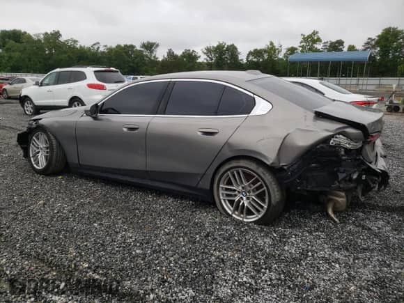 2024 BMW 5 Series 530i xDrive с VIN WBA53FJ09RCS08708, выставлен на аукционе Copart как лот 58371385 с пробегом 23 265 миль миль и Списание • Salvage title. История ставок и продаж доступна на DreamBid. Изображение 2.