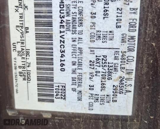 1997 Ford Explorer XL z VIN 1FMDU34E1VZC34160, wystawiony jako Copart lot #70461085 z przebiegiem 175 863 mil mil oraz Czysty tytuł • Clean title. Historia ofert i sprzedaży dostępna na DreamBid. Obrazek 13.