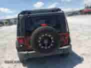 2007 Jeep Wrangler Unlimited Rubicon with VIN 1J4GA69127L155288, listed as a Copart auction lot 64615025 with 176,225 mi miles and Salvage title. Bid and sale history available at DreamBid. Image 6.