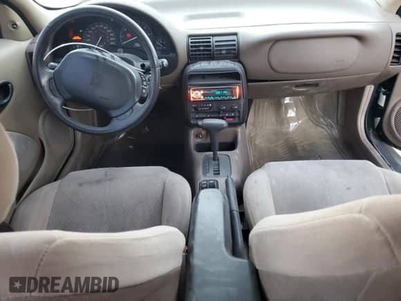 1998 Saturn SC с VIN 1G8ZH1279WZ120989, выставлен на аукционе Copart как лот 84348634 с пробегом 117 748 миль миль и На запчасти • Non repairable. История ставок и продаж доступна на DreamBid. Изображение 8.
