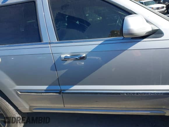 2009 Jeep Grand Cherokee with VIN 1J8HR68T39C540795, listed as a IAAI auction lot 41379112 with 236,624 mi miles and . Bid and sale history available at DreamBid. Image 13.