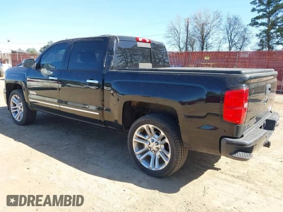 2014 Chevrolet Silverado 1500 High Country with VIN 3GCPCTEJ8EG301756, listed as a IAAI auction lot 41826109 with 185,576 mi miles and . Bid and sale history available at DreamBid. Image 3.