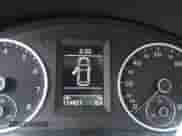 2011 Volkswagen Tiguan S with VIN WVGBV7AX0BW514599, listed as a IAAI auction lot 43051133 with 124,921 mi miles and . Bid and sale history available at DreamBid. Image 7.