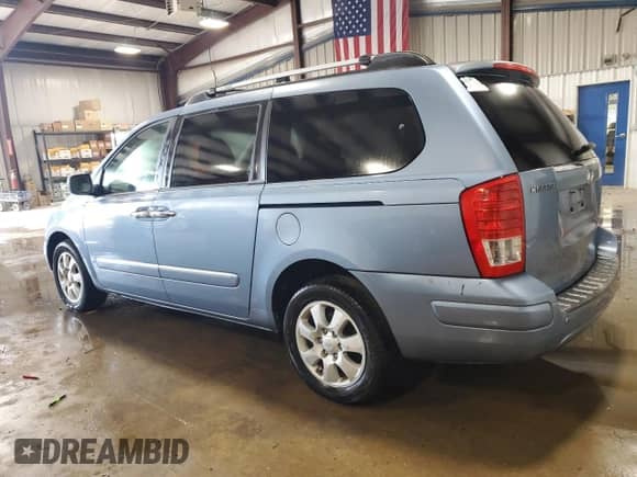 2007 Hyundai Entourage GLS with VIN KNDMC233076025109, listed as a Copart auction lot 74586814 with 124,057 mi miles and Salvage title. Bid and sale history available at DreamBid. Image 2.