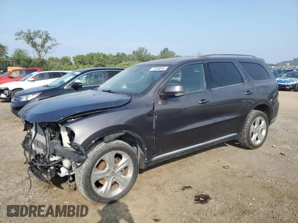 2014 Dodge Durango Limited with VIN 1C4RDJDG4EC306990, listed as a Copart auction lot 71255045 with Not provided miles and Salvage title. Bid and sale history available at DreamBid. Image 1.