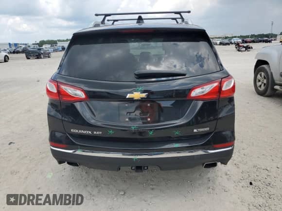 2018 Chevrolet Equinox Premier z VIN 2GNAXNEX7J6169497, wystawiony jako Copart lot #69195005 z przebiegiem 151 807 mil mil oraz Szkoda całkowita • Salvage title. Historia ofert i sprzedaży dostępna na DreamBid. Obrazek 6.