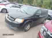 2011 Dodge Grand Caravan Mainstreet with VIN 2D4RN3DG6BR638816, listed as a IAAI auction lot 43379673 with 184,579 mi miles and . Bid and sale history available at DreamBid. Image 2.