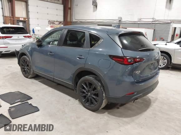 2022 Mazda CX-5 S Preferred z VIN JM3KFBCM1N0551165, wystawiony jako IAAI lot #42277023 z przebiegiem 34 115 mil mil oraz . Historia ofert i sprzedaży dostępna na DreamBid. Obrazek 3.