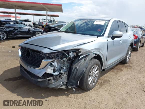 2023 Mazda CX-5 S Carbon Edition z VIN JM3KFBCM0P0137474, wystawiony jako IAAI lot #42785110 z przebiegiem 39 335 mil mil oraz . Historia ofert i sprzedaży dostępna na DreamBid. Obrazek 2.