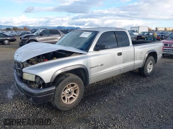 2002 Dodge Dakota с VIN 1B7GL12X42S698285, выставлен на аукционе IAAI как лот 40826030 с пробегом 211 936 миль миль и . История ставок и продаж доступна на DreamBid. Изображение 2.