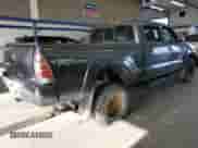 2014 Toyota Tacoma с VIN 5TFMU4FN4EX025885, выставлен на аукционе Copart как лот 89492635 с пробегом 161 136 миль миль и Списание • Salvage title. История ставок и продаж доступна на DreamBid. Изображение 3.