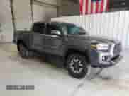 2023 Toyota Tacoma TRD Off Road with VIN 3TMCZ5ANXPM556723, listed as a Copart auction lot 81642695 with 53,753 mi miles and Clean title. Bid and sale history available at DreamBid. Image 4.