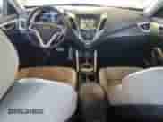 2013 Hyundai Veloster w/Black Int с VIN KMHTC6AD1DU087037, выставлен на аукционе Copart как лот 85126575 с пробегом 137 953 миль миль и Списание • Salvage title. История ставок и продаж доступна на DreamBid. Изображение 8.