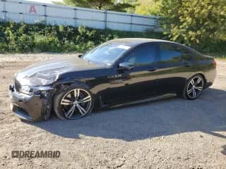 2016 BMW 7 Series 750i xDrive with VIN WBA7B0C57GG526950, listed as a Copart auction lot 81829615 with 84,030 mi miles and Clean title. Bid and sale history available at DreamBid. Image 1.