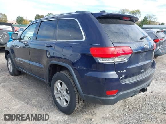 2015 Jeep Grand Cherokee Altitude with VIN 1C4RJFAG2FC190751, listed as a IAAI auction lot 43467163 with 162,685 mi miles and . Bid and sale history available at DreamBid. Image 3.