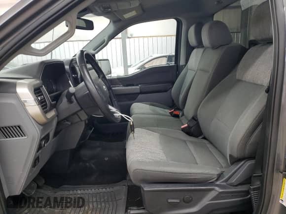 2021 Ford F-150 XL z VIN 1FTMF1EP7MKE58611, wystawiony jako Copart lot #56912955 z przebiegiem 30 850 mil mil oraz Szkoda całkowita • Salvage title. Historia ofert i sprzedaży dostępna na DreamBid. Obrazek 7.