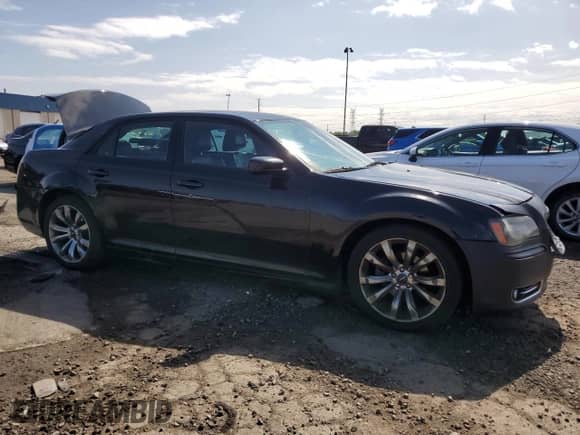 2014 Chrysler 300 S with VIN 2C3CCABG3EH357037, listed as a Copart auction lot 71667325 with 139,950 mi miles and Salvage title. Bid and sale history available at DreamBid. Image 4.