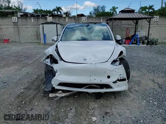 2021 Tesla Model Y Long Range with VIN 5YJYGDEE8MF092993, listed as a Copart auction lot 81125165 with 47,072 mi miles and Non repairable. Bid and sale history available at DreamBid. Image 13.