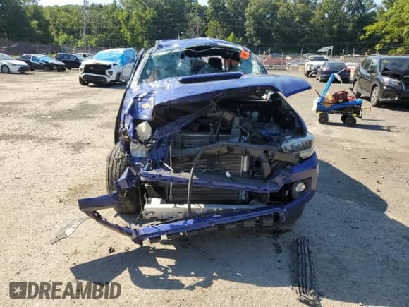 2022 Toyota Tacoma SR z VIN 3TMCZ5AN1NM456734, wystawiony jako Copart lot #69681605 z przebiegiem Nie podano mil oraz Szkoda całkowita • Salvage title. Historia ofert i sprzedaży dostępna na DreamBid. Obrazek 5.
