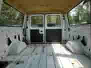 2004 Ford Econoline Cargo z VIN 1FTSE34LX4HB53489, wystawiony jako Copart lot #57730845 z przebiegiem 207 547 mil mil oraz Czysty tytuł • Clean title. Historia ofert i sprzedaży dostępna na DreamBid. Obrazek 10.