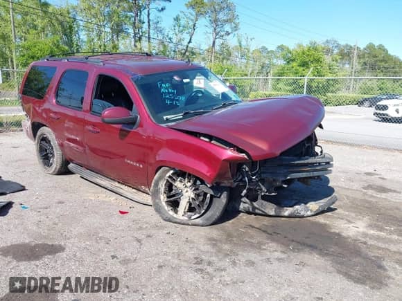 2009 Chevrolet Tahoe 2LT z VIN 1GNFK23059R125278, wystawiony jako IAAI lot #42059416 z przebiegiem 174 502 mil mil oraz . Historia ofert i sprzedaży dostępna na DreamBid. Obrazek 1.