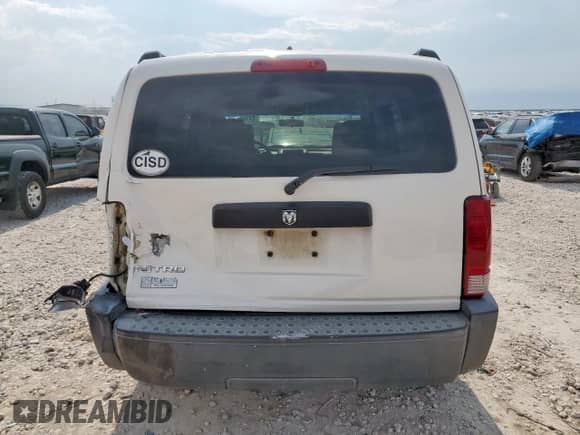 2007 Dodge Nitro SXT z VIN 1D8GT28K67W597011, wystawiony jako Copart lot #69780615 z przebiegiem 144 494 mil mil oraz Szkoda całkowita • Salvage title. Historia ofert i sprzedaży dostępna na DreamBid. Obrazek 6.