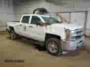 2015 Chevrolet Silverado 2500HD Work Truck z VIN 1GC1KUEG5FF652954, wystawiony jako Copart lot #56283235 z przebiegiem 235 014 mil mil oraz Szkoda całkowita • Salvage title. Historia ofert i sprzedaży dostępna na DreamBid. Obrazek 4.