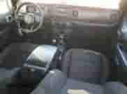 2023 Jeep Wrangler Sport S with VIN 1C4HJXDG7PW617662, listed as a Copart auction lot 86186065 with 34,124 mi miles and Salvage title. Bid and sale history available at DreamBid. Image 8.