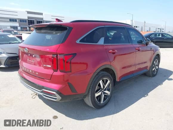 2021 Kia Sorento EX with VIN 5XYRH4LF2MG035520, listed as a IAAI auction lot 43082282 with 95,850 mi miles and . Bid and sale history available at DreamBid. Image 4.