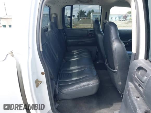 2002 Dodge Dakota SLT with VIN 1B7HL48N42S607446, listed as a IAAI auction lot 42303573 with 250,601 mi miles and . Bid and sale history available at DreamBid. Image 8.