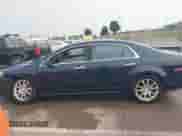 2012 Chevrolet Malibu LTZ 1LZ z VIN 1G1ZE5E08CF264561, wystawiony jako IAAI lot #43153788 z przebiegiem 160 864 mil mil oraz . Historia ofert i sprzedaży dostępna na DreamBid. Obrazek 14.