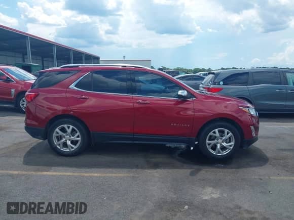 2020 Chevrolet Equinox Premier with VIN 2GNAXNEV6L6262478, listed as a IAAI auction lot 42829038 with 51,303 mi miles and . Bid and sale history available at DreamBid. Image 13.