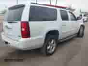 2009 Chevrolet Suburban 1LT z VIN 1GNFC260X9J108211, wystawiony jako IAAI lot #42237663 z przebiegiem Nie podano mil oraz . Historia ofert i sprzedaży dostępna na DreamBid. Obrazek 4.