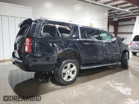2017 Chevrolet Suburban Premier с VIN 1GNSCJKC9HR154444, выставлен на аукционе Copart как лот 71589415 с пробегом 113 687 миль миль и Списание • Salvage title. История ставок и продаж доступна на DreamBid. Изображение 3.