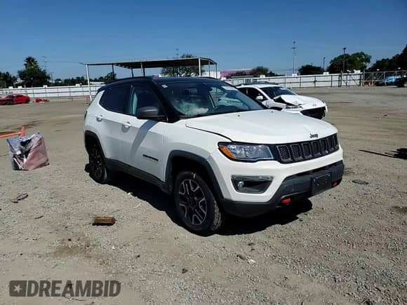 2019 Jeep Compass Trailhawk z VIN 3C4NJDDB0KT709670, wystawiony jako Copart lot #84705395 z przebiegiem 65 589 mil mil oraz Szkoda całkowita • Salvage title. Historia ofert i sprzedaży dostępna na DreamBid. Obrazek 14.
