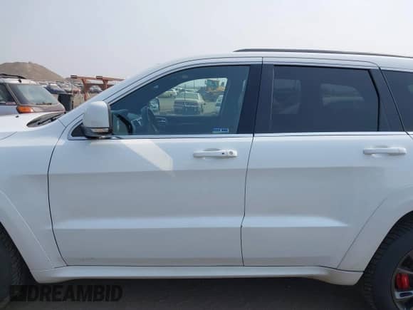 2014 Jeep Grand Cherokee SRT-8 с VIN 1C4RJFDJ1EC512558, выставлен на аукционе IAAI как лот 43102961 с пробегом 63 307 миль миль и . История ставок и продаж доступна на DreamBid. Изображение 15.