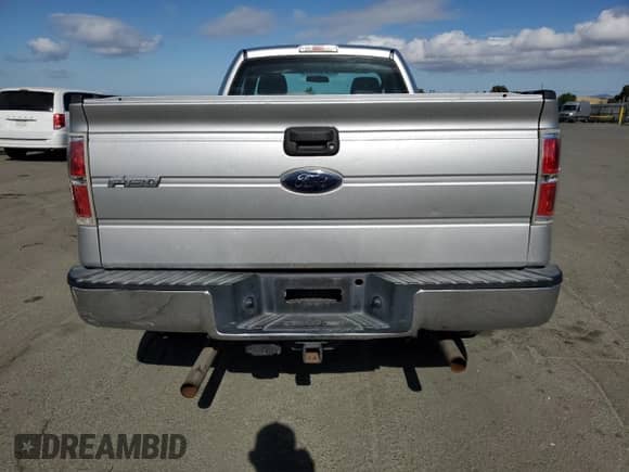 2010 Ford F-150 XL with VIN 1FTMF1C87AKC33435, listed as a Copart auction lot 56764885 with 117,575 mi miles and Clean title. Bid and sale history available at DreamBid. Image 6.