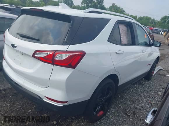 2021 Chevrolet Equinox Premier with VIN 2GNAXNEV7M6151875, listed as a IAAI auction lot 42580389 with Not provided miles and . Bid and sale history available at DreamBid. Image 4.