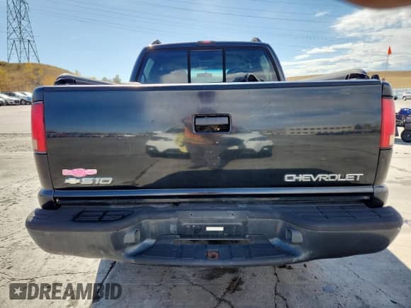 2003 Chevrolet S-10 LS with VIN 1GCDT13X53K180687, listed as a Copart auction lot 89549505 with 142,593 mi miles and Salvage title. Bid and sale history available at DreamBid. Image 6.