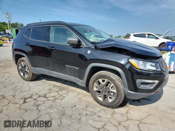 2017 Jeep Compass Trailhawk with VIN 3C4NJDDB6HT641433, listed as a Copart auction lot 65556115 with 62,150 mi miles and Salvage title. Bid and sale history available at DreamBid. Image 4.
