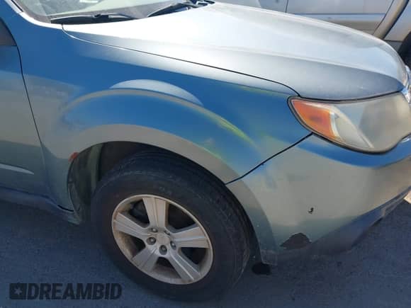 2012 Subaru Forester X z VIN JF2SHABC8CH432356, wystawiony jako IAAI lot #43390315 z przebiegiem 167 937 mil mil oraz . Historia ofert i sprzedaży dostępna na DreamBid. Obrazek 6.