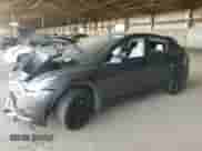 2021 Tesla Model Y Long Range with VIN 5YJYGDEE7MF206059, listed as a Copart auction lot 80559965 with 77,329 mi miles and Salvage title. Bid and sale history available at DreamBid. Image 1.