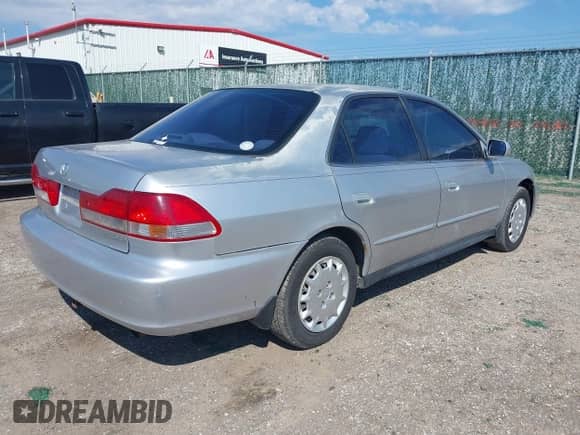 2001 Honda Accord LX with VIN JHMCG56431C014909, listed as a IAAI auction lot 43228547 with 307,350 mi miles and . Bid and sale history available at DreamBid. Image 4.