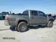 2014 Toyota Tacoma PreRunner z VIN 5TFJU4GN3EX052089, wystawiony jako Copart lot #85092355 z przebiegiem 106 271 mil mil oraz Szkoda całkowita • Salvage title. Historia ofert i sprzedaży dostępna na DreamBid. Obrazek 3.