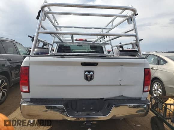 2016 Ram 1500 Tradesman z VIN 3C6JR6DT3GG285517, wystawiony jako Copart lot #66202804 z przebiegiem 43 666 mil mil oraz Szkoda całkowita • Salvage title. Historia ofert i sprzedaży dostępna na DreamBid. Obrazek 6.