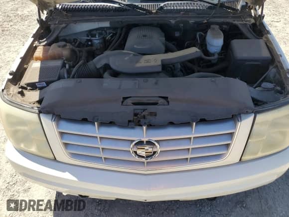 2004 Cadillac Escalade with VIN 1GYEC63T94R142929, listed as a Copart auction lot 58657835 with 147,193 mi miles and Clean title. Bid and sale history available at DreamBid. Image 12.