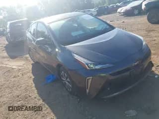 2021 Toyota Prius LE with VIN JTDL9MFU8M3028928, listed as a IAAI auction lot 43099318 with 72,833 mi miles and . Bid and sale history available at DreamBid. Image 1.