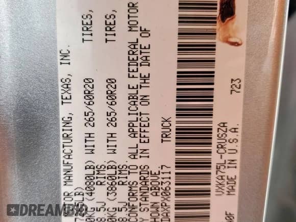 2023 Toyota Tundra SR5 with VIN 5TFLA5DAXPX063117, listed as a Copart auction lot 50590875 with 60,409 mi miles and Salvage title. Bid and sale history available at DreamBid. Image 12.