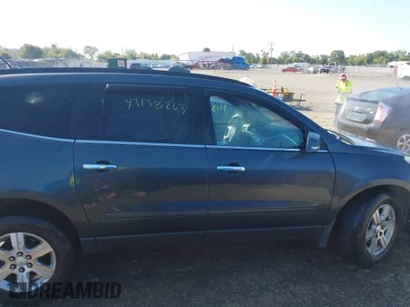 2011 Chevrolet Traverse 1LT with VIN 1GNKVGED1BJ127763, listed as a IAAI auction lot 43138263 with 179,989 mi miles and . Bid and sale history available at DreamBid. Image 13.